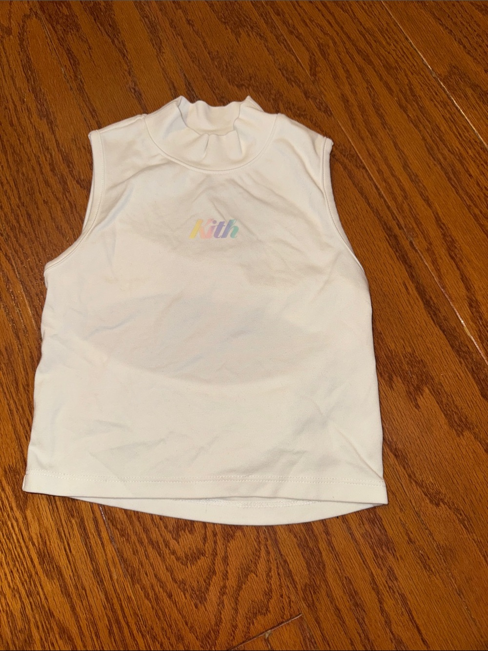 KITH girls White Sleeveless Kids Top with Subtle Pastel Logo